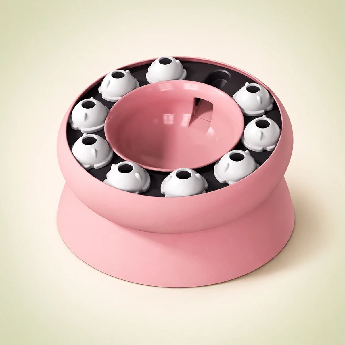 Pink indoor cat puzzle feeder with rotating treat compartments